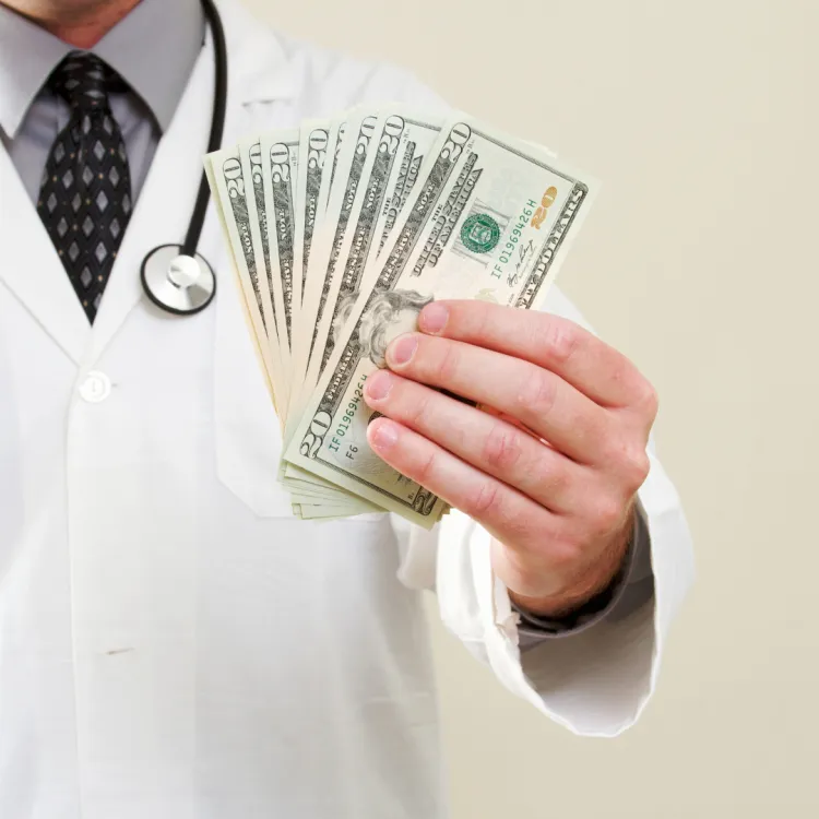 Doctor with cash representing the financial stakes of corporate compliance
